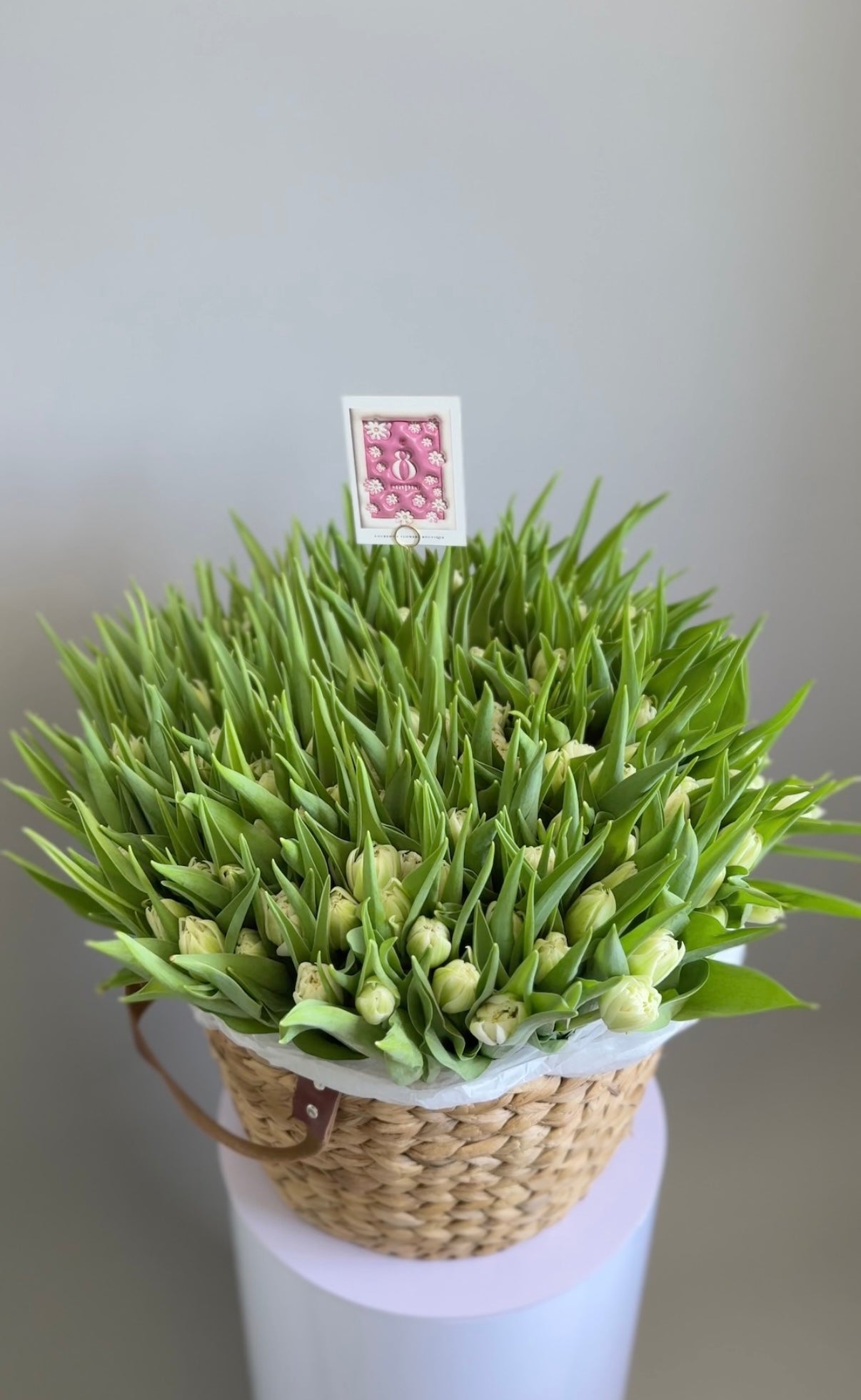 White double tulips in basket