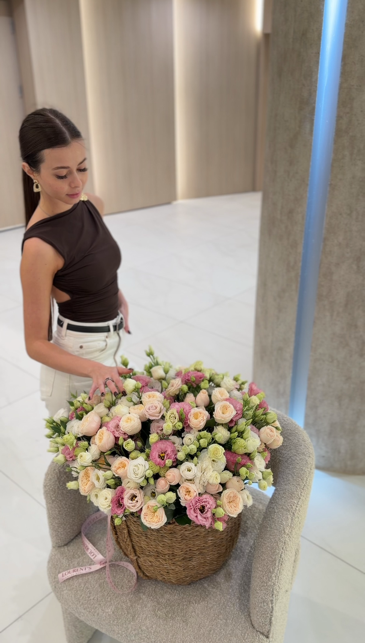 Basket with lisianthus and garden roses